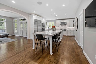 A Stunningly Bright Kitchen and Functional Laundry Room Complete this Oakton Home’s Main Level