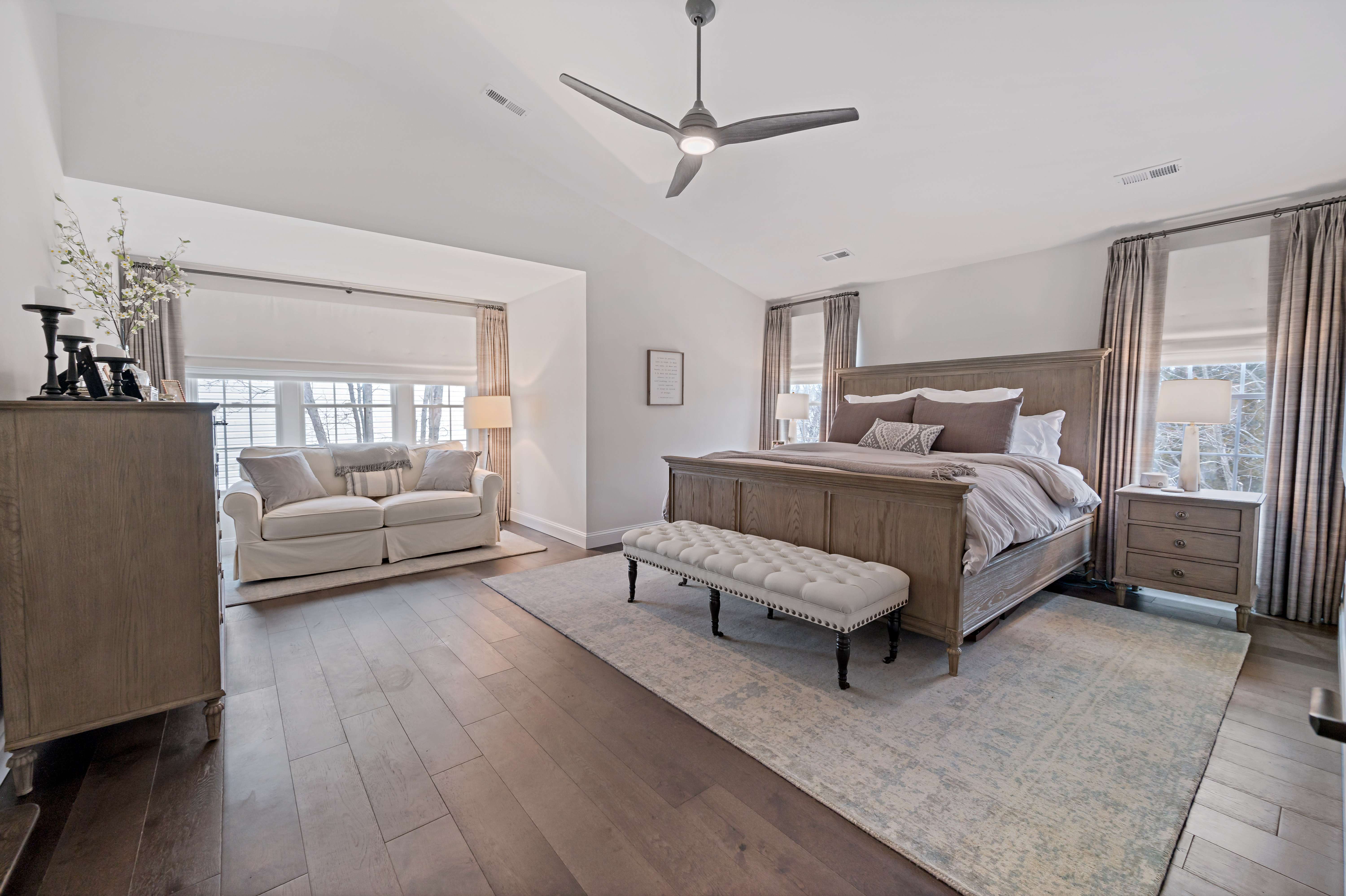 Ashburn bedroom with cozy brown aesthetic and high ceilings