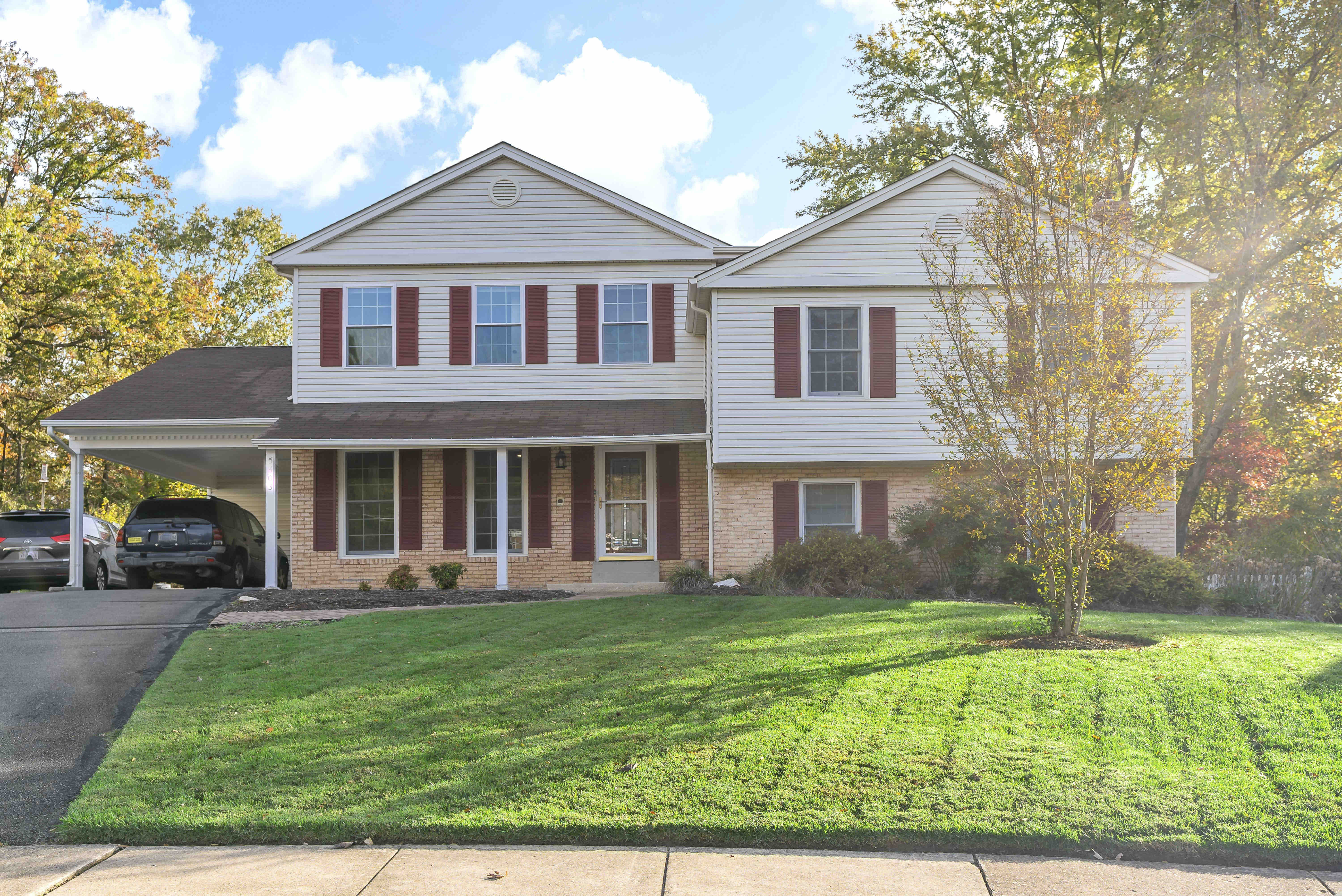Front view of house with pop-top addition