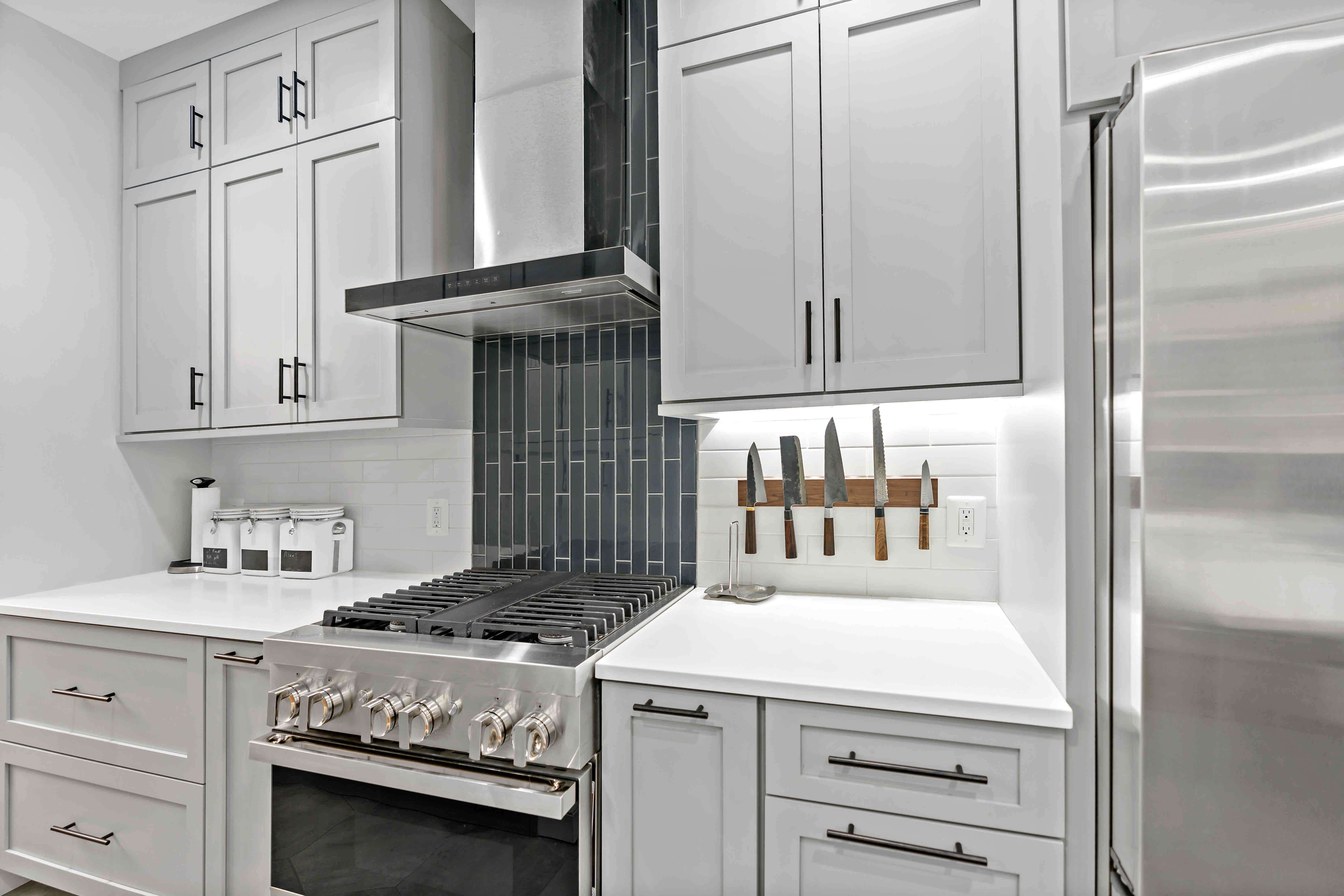 White kitchen with magnetic strip to hold knives