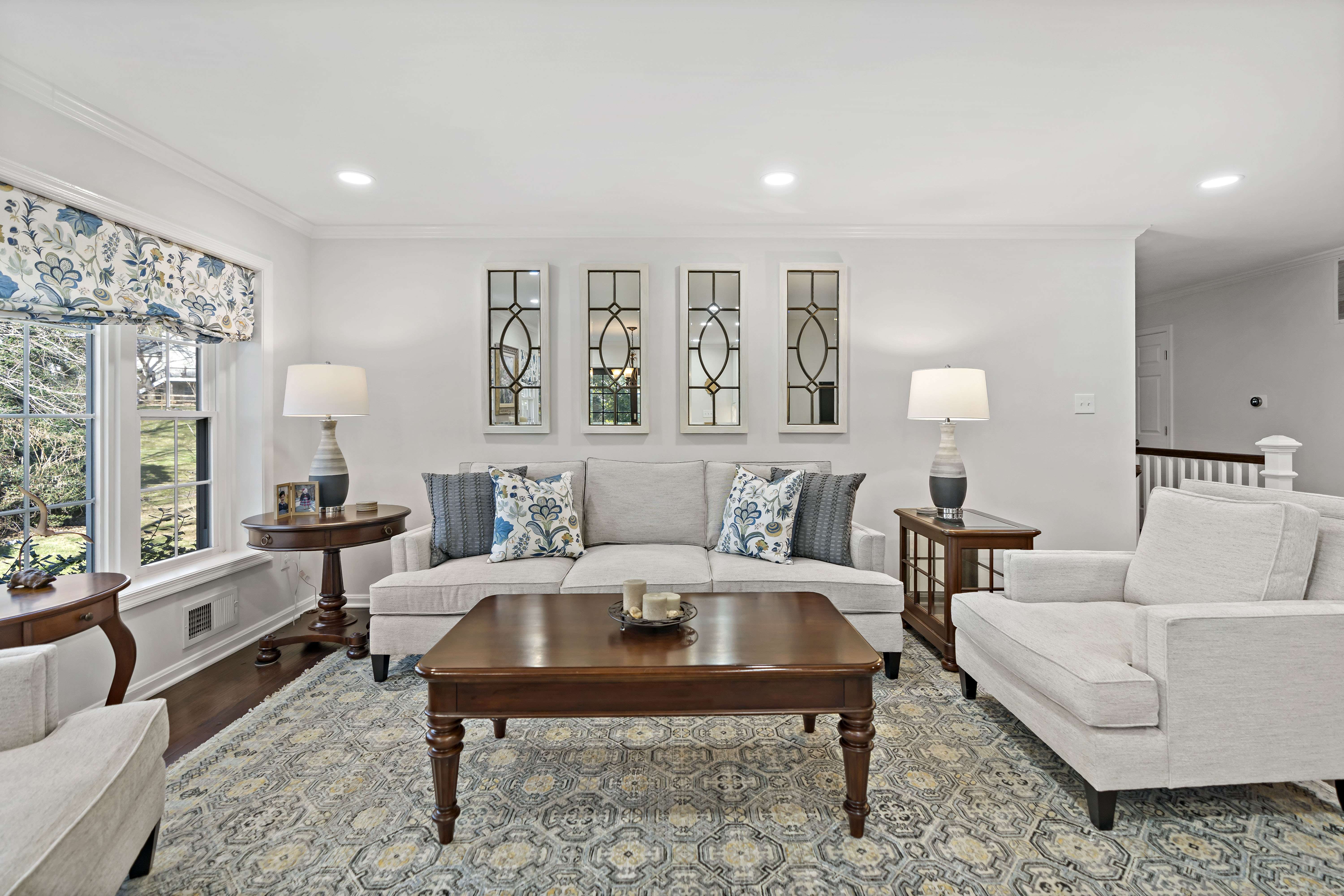 Cozy living room with dark wood traaditional furniture
