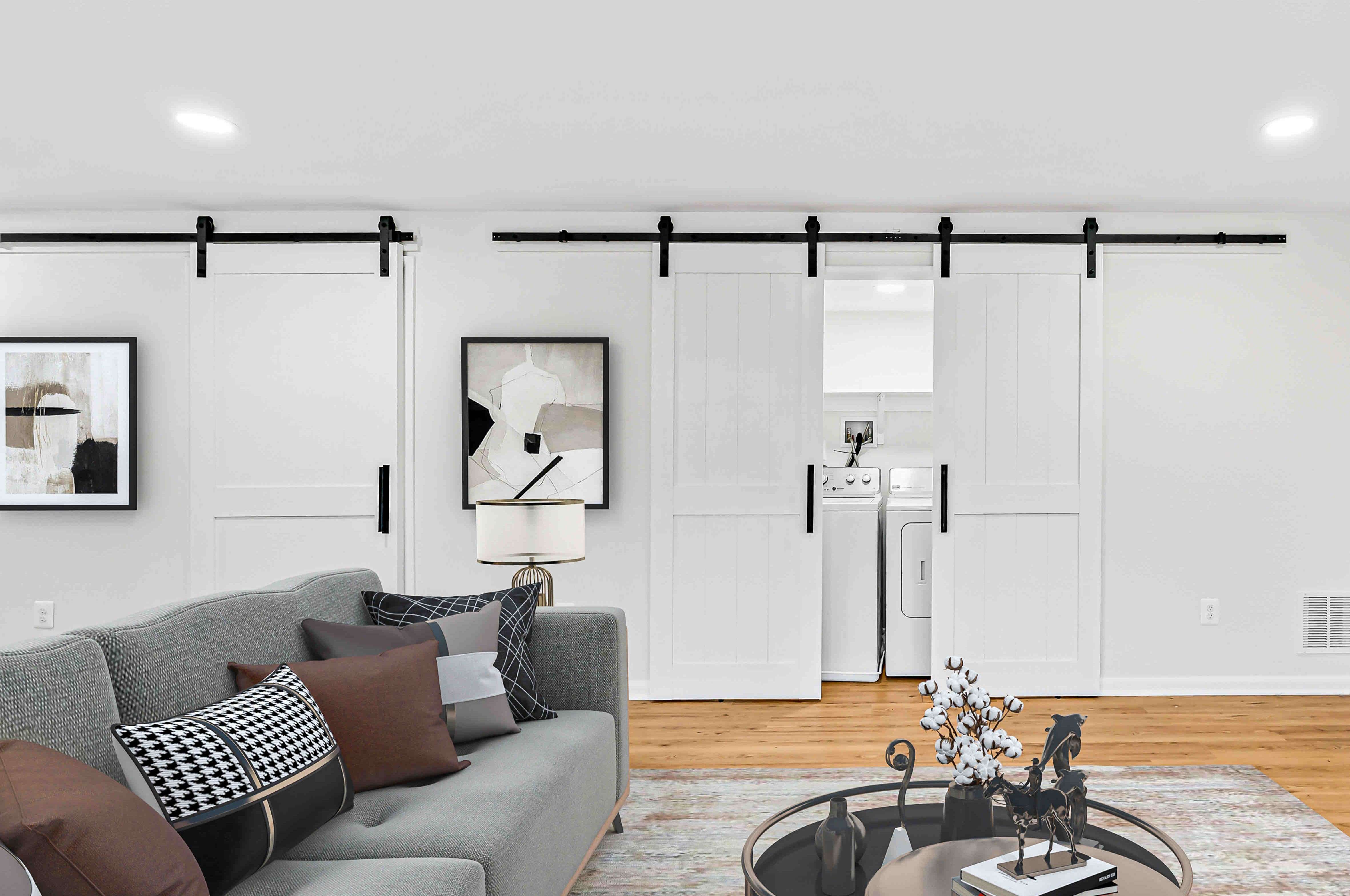 White sliding barn door to cover laundry room